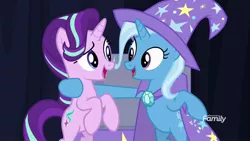 Size: 1920x1080 | Tagged: safe, derpibooru import, screencap, starlight glimmer, trixie, pony, unicorn, road to friendship, bipedal, bipedal leaning, cape, clothes, duo, eye contact, female, hat, leaning, looking at each other, mare, trixie's cape, trixie's hat