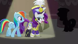 Size: 1440x807 | Tagged: safe, derpibooru import, screencap, applejack, rainbow dash, rarity, pegasus, pony, unicorn, testing testing 1-2-3, ancient wonderbolts uniform, clothes, costume, duo focus, female, hat, mare, open mouth, sgt. rarity, shako, spotlight, uniform