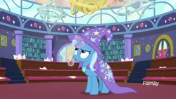 Size: 1920x1080 | Tagged: safe, derpibooru import, screencap, trixie, pony, unicorn, a matter of principals, banana, bananaphone, cape, clothes, discovery family logo, female, food, glowing horn, hat, horn, magic, mare, solo, trixie's cape, trixie's hat