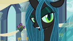 Size: 960x540 | Tagged: a canterlot wedding, changeling, changeling queen, derpibooru import, female, lidded eyes, looking at you, queen chrysalis, safe, screencap, solo