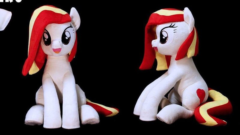 Size: 1155x650 | Tagged: safe, artist:nekokevin, derpibooru import, oc, oc:poniko, earth pony, pony, female, irl, looking at you, mare, open mouth, photo, plushie, sitting, smiling, solo, underhoof