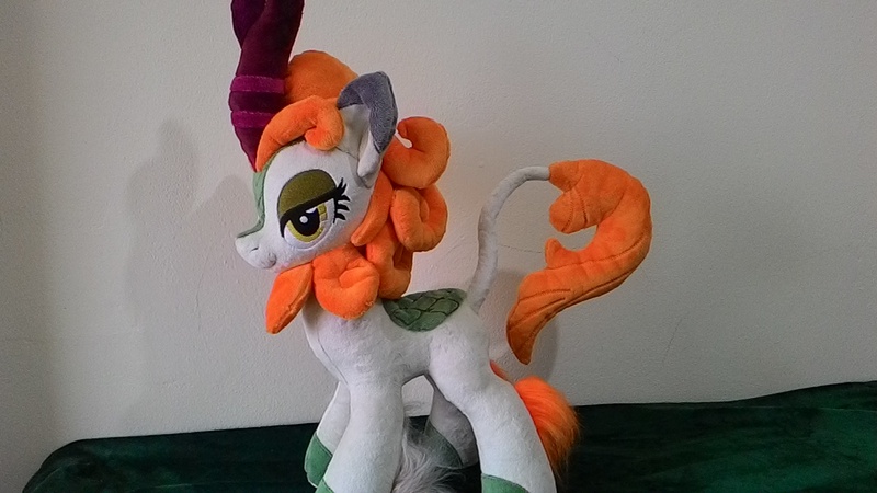 Size: 1600x900 | Tagged: artist:masha05, autumn blaze, derpibooru import, female, irl, kirin, lidded eyes, photo, plushie, safe, solo, sounds of silence, toy