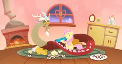 Size: 1500x800 | Tagged: safe, artist:jgu112, derpibooru import, discord, fluttershy, draconequus, pegasus, pony, cookie, cup, duo, female, fireplace, folded wings, food, indoors, interior, looking at each other, mare, prone, sitting, smiling, tea party, teacup, teapot, window, wings
