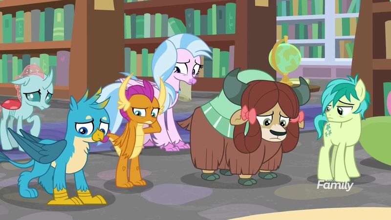 Size: 1920x1080 | Tagged: safe, derpibooru import, screencap, gallus, ocellus, sandbar, silverstream, smolder, yona, changedling, changeling, classical hippogriff, dragon, earth pony, gryphon, hippogriff, pony, yak, what lies beneath, bookshelf, bow, cloven hooves, dragoness, female, globe, hair bow, jewelry, library, male, monkey swings, necklace, sad, student six, teenager