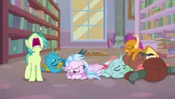 Size: 1280x720 | Tagged: safe, derpibooru import, screencap, gallus, ocellus, sandbar, silverstream, smolder, yona, changedling, changeling, classical hippogriff, dragon, earth pony, gryphon, hippogriff, pony, yak, what lies beneath, bookshelf, bow, cloven hooves, dragoness, eyes closed, female, hair bow, jewelry, library, male, monkey swings, necklace, nose in the air, student six, teenager, volumetric mouth, yawn