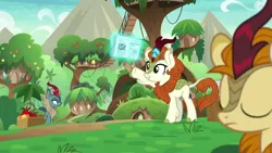 Size: 1280x720 | Tagged: autumn afternoon, autumn blaze, background kirin, derpibooru import, eyes closed, kirin, kirin village, levitation, magic, magic aura, newspaper, safe, screencap, smiling, sounds of silence, sparkling brook, telekinesis, written equestrian