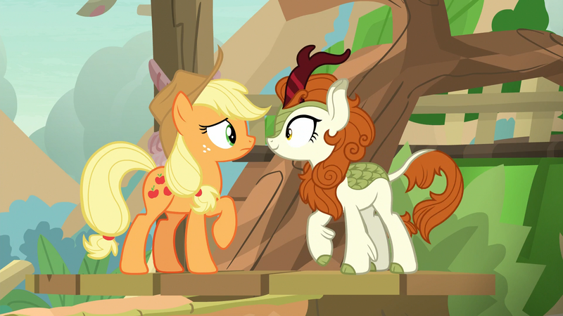 Size: 1920x1080 | Tagged: safe, derpibooru import, screencap, applejack, autumn blaze, earth pony, kirin, pony, sounds of silence, spoiler:s08, cloven hooves, cowboy hat, duo, female, forest, grin, hat, mare, mountain, raised hoof, sky, smiling, stare, tree