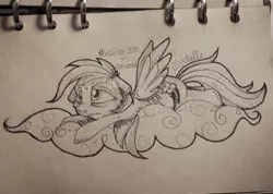 Size: 600x426 | Tagged: safe, artist:mychelle, derpibooru import, rainbow dash, pony, cloud, inktober, monochrome, prone, solo, traditional art