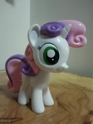 Size: 3120x4160 | Tagged: safe, derpibooru import, photographer:apex soundwave, sweetie belle, pony, unicorn, collectible, female, filly, funko, irl, mare, photo, small, solo, toy, vinyl collectible, vinyl figure