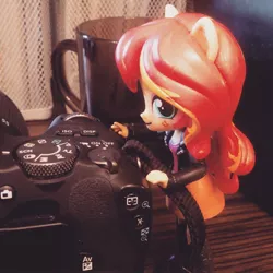 Size: 1080x1080 | Tagged: safe, artist:artofmagicpoland, artist:flanksyofficial, derpibooru import, sunset shimmer, equestria girls, camera, canon 200d, cup, doll, equestria girls minis, eqventures of the minis, instagram, solo, toy