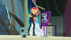 Size: 1280x720 | Tagged: safe, derpibooru import, screencap, sci-twi, sunset shimmer, twilight sparkle, robot, all the world's off stage, equestria girls, equestria girls series, all the world's off stage: twilight sparkle, clipboard, clothes, director shimmer, duo, female, geode of telekinesis, glasses, headset, high heels, magical geodes, ponytail, school play, shoes, skirt