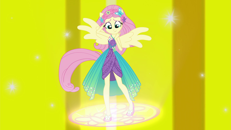 Size: 1920x1080 | Tagged: safe, derpibooru import, screencap, fluttershy, equestria girls, equestria girls series, forgotten friendship, clothes, female, ponied up, solo, spread wings, standing, super ponied up, super sentai stance, wings, yellow