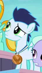 Size: 227x396 | Tagged: safe, derpibooru import, screencap, soarin', pegasus, pony, parental glideance, bronze medal, colt, confused, cropped, cute, flashback, foal, frown, green eyes, looking up, male, raised eyebrow, solo focus, younger