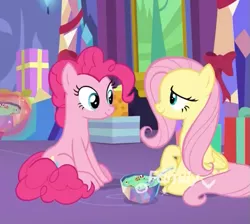 Size: 603x540 | Tagged: safe, derpibooru import, screencap, fluttershy, pinkie pie, earth pony, pegasus, pony, best gift ever, bowl, cropped, discovery family logo, duo, female, food, mare, pudding, puddinghead's pudding, sitting, smiling