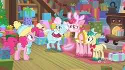 Size: 1920x1080 | Tagged: safe, derpibooru import, screencap, alice the reindeer, aurora the reindeer, bori the reindeer, pinkie pie, deer, earth pony, pony, reindeer, best gift ever, apron, bell, bow, clothes, cloven hooves, colored hooves, deer magic, discovery family logo, doe, female, glowing antlers, grove of the gift givers, hat, levitation, magic, magic aura, mare, present, raised hoof, scarf, shawl, telekinesis, the gift givers