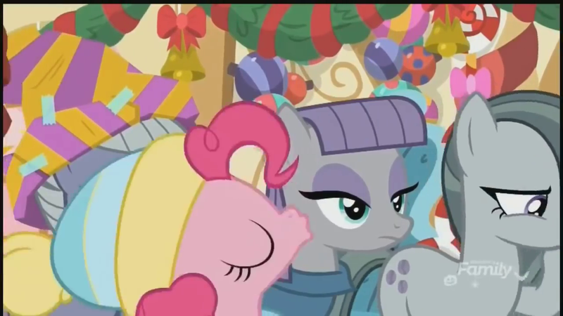 Size: 1280x720 | Tagged: safe, derpibooru import, screencap, limestone pie, marble pie, maud pie, pinkie pie, earth pony, pony, best gift ever, decoration, discovery family logo, eyes closed, female, hat, kiss on the cheek, kissing, mare, maud being maud, pie sisters, platonic kiss, siblings, sisters
