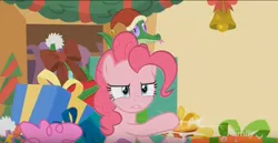 Size: 842x433 | Tagged: safe, derpibooru import, screencap, gummy, pinkie pie, alligator, earth pony, pony, best gift ever, bell, box, christmas, female, hat, holiday, male, mare, present, santa hat, smashing