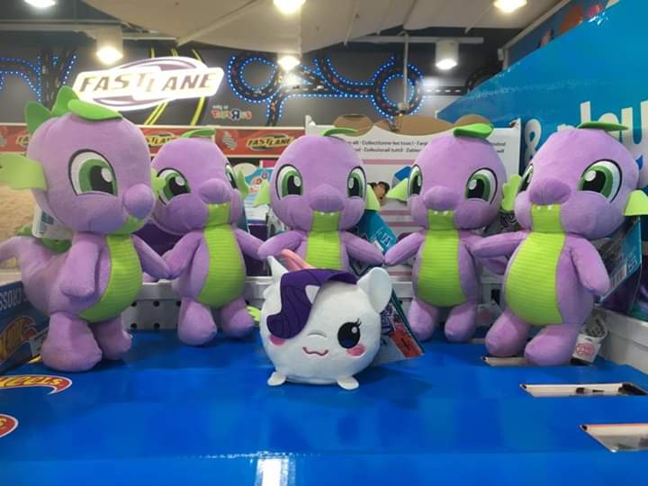 Size: 720x540 | Tagged: safe, derpibooru import, photographer:charleschiamchuangchao, rarity, spike, female, irl, malaysia, male, multeity, photo, piper perri surrounded, plushie, shipping, sparity, straight, toys r us