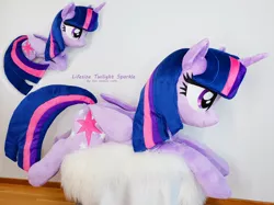 Size: 3546x2659 | Tagged: safe, artist:epicrainbowcrafts, derpibooru import, twilight sparkle, twilight sparkle (alicorn), alicorn, pony, female, folded wings, horn, irl, lidded eyes, life size, mare, photo, plushie, ponyloaf, prone, solo, wings