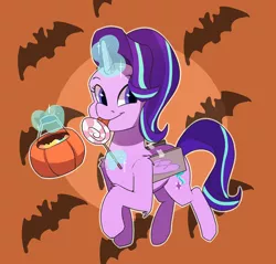 Size: 2200x2100 | Tagged: safe, artist:passigcamel, derpibooru import, starlight glimmer, bat, pony, unicorn, candy, clothes, costume, cute, eating, fake wings, female, food, glimmerbetes, glowing horn, halloween, holiday, horn, lollipop, looking at you, magic, mare, mlem, silly, solo, telekinesis, tongue out, trick or treat