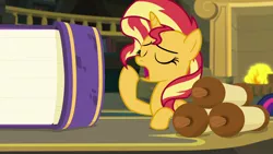 Size: 1920x1080 | Tagged: safe, derpibooru import, screencap, sunset shimmer, pony, equestria girls, equestria girls series, forgotten friendship, book, female, fireplace, impossibly large book, mare, scroll, solo, yawn