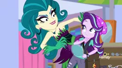 Size: 1280x720 | Tagged: safe, derpibooru import, screencap, juniper montage, starlight glimmer, equestria girls, mirror magic, spoiler:eqg specials, beanie, discovery family logo, female, giantess, hat, juniper monstar, macro, mirror, sunglasses