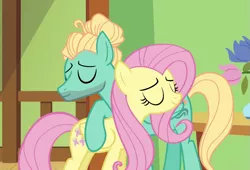 Size: 1059x720 | Tagged: safe, derpibooru import, screencap, fluttershy, zephyr breeze, pegasus, pony, flutter brutter, brother and sister, cropped, cutie mark, duo, eyes closed, female, hug, male, mare, siblings, smiling, stallion