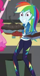 Size: 427x807 | Tagged: safe, derpibooru import, screencap, pinkie pie, rainbow dash, a queen of clubs, equestria girls, equestria girls series, awkward smile, burned, clothes, cropped, female, food, geode of super speed, jacket, magical geodes, mittens, offscreen character, pants, pie, smiling