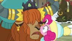 Size: 1280x720 | Tagged: safe, derpibooru import, screencap, pinkie pie, prince rutherford, pony, yak, best gift ever, bell, crown, duo, ear piercing, earring, female, hair over eyes, hat, horn, horn ring, jewelry, male, mare, nose to nose, nose wrinkle, piercing, regalia, ring