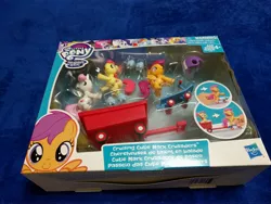 Size: 4032x3024 | Tagged: safe, derpibooru import, apple bloom, scootaloo, sweetie belle, pony, box, cutie mark crusaders, guardians of harmony, helmet, irl, photo, pony pulls the wagon, scooter, skates, toy, wagon