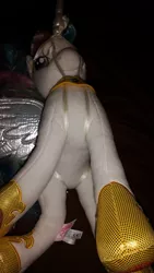 Size: 1836x3264 | Tagged: suggestive, derpibooru import, princess celestia, alicorn, pony, bondage, butt, female, femsub, hoof shoes, horn, irl, jewelry, mare, merch sexploitation, peytral, photo, plushie, ribbon, shibari, simple background, solo, solo female, sublestia, submissive, sunbutt, tiara, tied, tied up, toy, wings