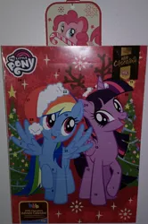 Size: 1835x2770 | Tagged: safe, derpibooru import, pinkie pie, rainbow dash, twilight sparkle, twilight sparkle (alicorn), alicorn, pony, advent calendar, candy, candy cane, christmas, christmas lights, christmas tree, finland, food, hat, holiday, my little pony logo, santa hat, tree