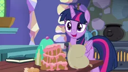Size: 1280x720 | Tagged: safe, derpibooru import, screencap, twilight sparkle, twilight sparkle (alicorn), alicorn, pony, best gift ever, book, cake, cauldron, female, flour, food, kitchen, mare, oven, solo, table