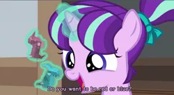 Size: 1231x677 | Tagged: safe, derpibooru import, screencap, starlight glimmer, pony, unicorn, uncommon bond, board game, cute, dragon pit, female, filly, filly starlight glimmer, glimmerbetes, glowing horn, horn, magic, solo, subtitles, telekinesis, younger