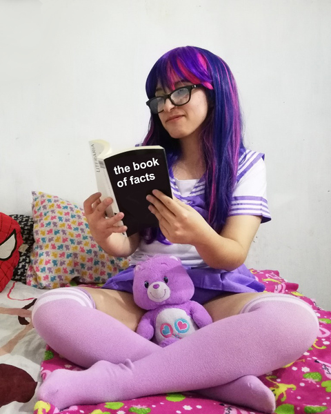 Size: 768x960 | Tagged: artist:ribbonbell, bed, book, caption, care bears, clothes, cosplay, costume, derpibooru import, human, irl, irl human, long socks, photo, safe, sailor uniform, share bear, socks, thigh highs, twilight sparkle, uniform