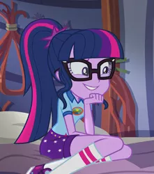 Size: 953x1079 | Tagged: safe, derpibooru import, screencap, sci-twi, twilight sparkle, equestria girls, legend of everfree, legend of everfree - bloopers, bed, camp everfree outfits, clothes, converse, cropped, glasses, ponytail, shoes, smiling, sneakers