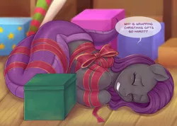 Size: 1760x1252 | Tagged: safe, artist:evomanaphy, derpibooru import, oc, unofficial characters only, lamia, original species, accidental bondage, bondage, christmas, dialogue, female, gift wrapped, holiday, present, ribbon, solo, tied up