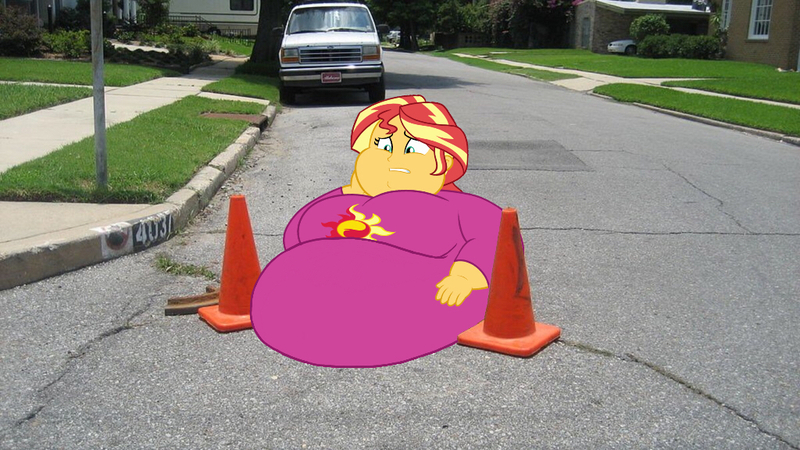 Size: 1024x576 | Tagged: safe, artist:jamesawilliams1996, artist:neongothic, artist:secretgoombaman12345, derpibooru import, sunset shimmer, series:sunset's great when she's fat, equestria girls, bbw, belly, big belly, breasts, car, chubby cheeks, clothes, cone, equestria girls in real life, fat, female, huge belly, irl, manhole, morbidly obese, obese, pajamas, photo, road, slobset shimmer, ssbbw, stuck, tight clothing, wat