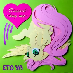 Size: 2693x2693 | Tagged: suggestive, artist:eto ya, artist:jiuweidehuli, derpibooru import, fluttershy, pegasus, pony, chest fluff, craft, female, floppy ears, heart, hooves to the chest, looking at you, mare, papercraft, shadowbox, smiling, solo, solo female, spread wings, strategically covered, tail censor, underhoof, upside down, wings
