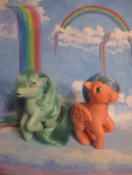 Size: 774x1032 | Tagged: safe, artist:sunset80, derpibooru import, firefly, medley, pegasus, pony, backdrop, cloud, duo, g1, painting, photo, rainbow, toy, traditional art