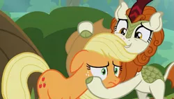 Size: 1013x578 | Tagged: applejack, autumn blaze, derpibooru import, female, hug, kirin, mare, safe, screencap, season 8, sounds of silence, spoiler:s08