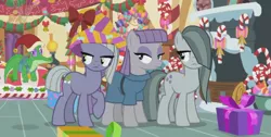 Size: 670x339 | Tagged: safe, derpibooru import, screencap, gummy, limestone pie, marble pie, maud pie, best gift ever, candy, candy cane, christmas, female, fireplace, floating, food, hat, hearth's warming, holiday, mare, paper hat, pie sisters, pinkie pie's room, present, santa hat, siblings, sisters, sugarcube corner