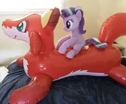 Size: 3651x3024 | Tagged: safe, derpibooru import, starlight glimmer, fox, pony, unicorn, inflatable, inflatable toy, irl, photo, plushie, pool toy, riding, sitting