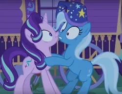 Size: 828x638 | Tagged: safe, derpibooru import, screencap, starlight glimmer, trixie, pony, unicorn, to where and back again, boop, cropped, duo, female, hat, mare, nightcap, nose to nose, nose wrinkle, noseboop, scrunchy face, trixie's wagon, wavy mouth