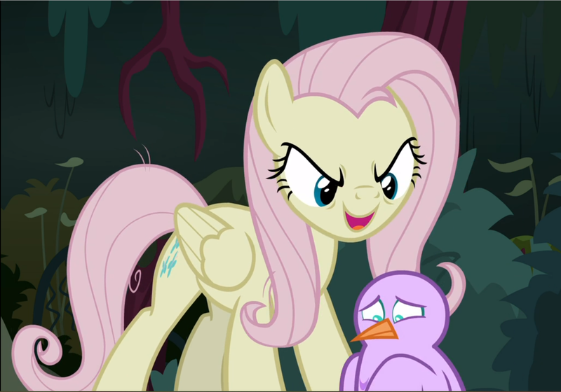 Size: 1345x941 | Tagged: safe, derpibooru import, screencap, fluttershy, mean fluttershy, bird, pony, the mean 6, clone, cropped, evil grin, female, flutterbitch, grin, open mouth, sinister, smiling