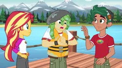 Size: 1920x1080 | Tagged: safe, derpibooru import, screencap, sandalwood, sunset shimmer, timber spruce, equestria girls, legend of everfree, camp everfree outfits, clothes, female, forest, lake, lifejacket, male, mountain, mountain range, pier, shorts, water