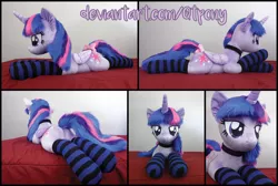 Size: 4429x2979 | Tagged: safe, artist:qtpony, derpibooru import, twilight sparkle, twilight sparkle (alicorn), alicorn, pony, bow, butt, clothes, folded wings, horn, irl, lidded eyes, photo, plot, plushie, prone, socks, solo, striped socks, tail bow, wings