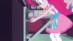 Size: 1280x720 | Tagged: safe, derpibooru import, screencap, pinkie pie, equestria girls, equestria girls series, the craft of cookies, spoiler:eqg series (season 2), apron, baking, clothes, oven, photo, solo