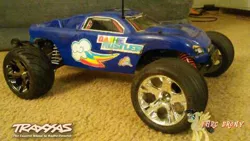 Size: 480x270 | Tagged: safe, artist:forzaveteranenigma, derpibooru import, rainbow dash, pony, car, carpet, photo, radio control, rc car, solo, stadium truck, traxxas, traxxas rustler, truggy, watermark