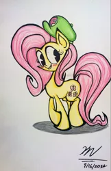 Size: 775x1199 | Tagged: safe, artist:evilstaplers, artist:pelate, derpibooru import, fluttershy, pony, blushing, cute, female, hat, looking away, looking sideways, mare, shy, smiling, solo, standing, traditional art, wingless